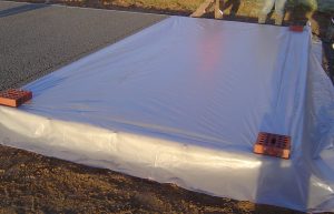 couler du beton sous la pluie