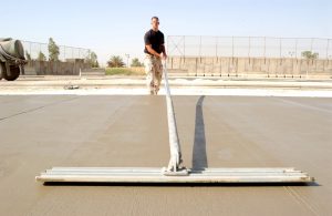 taloche à manche télescopique