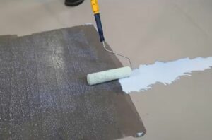 appliquer un primaire d'adhérence sur une dalle béton